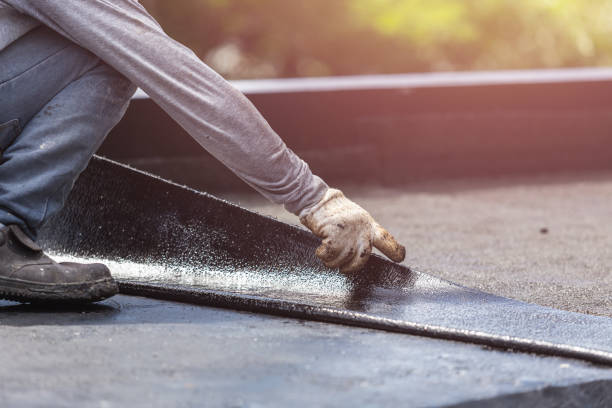 Professional Basement Waterproofing technician working in Sumava Resorts, IN